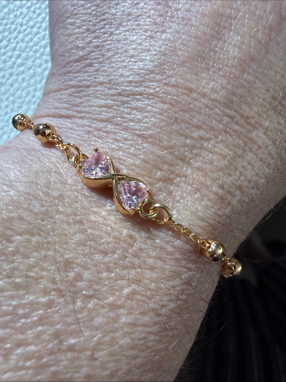 Gold Filled Infinity Bracelet with Pink Stones
